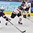 PLYMOUTH, MICHIGAN - APRIL 6: Canada's Haley Irwin #21 stick handles the puck while U.S.'s Alex Carpenter #25 attempts to block the lane during the gold medal game at the 2017 IIHF Ice Hockey Women's World Championship. (Photo by Minas Panagiotakis/HHOF-IIHF Images)